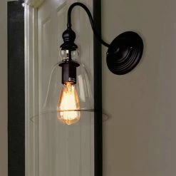 Budget 🌟 Warehouse Of Tiffany Tamrion Black Metal 1-light Wall Sconce Clear Glass Shade With Edison Bulb 🛒
