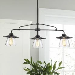 Best deal ✔️ Warehouse Of Tiffany Temet Matte Black Linear 3-Lamp Chandelier With Hooded Glass Shades 👏